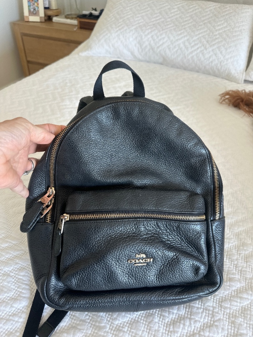 Black leather Coach backpack